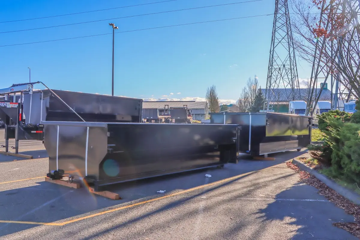 Roll-off dumpster ready for waste disposal at job site for Commercial Dumpster Rental in Dickinson